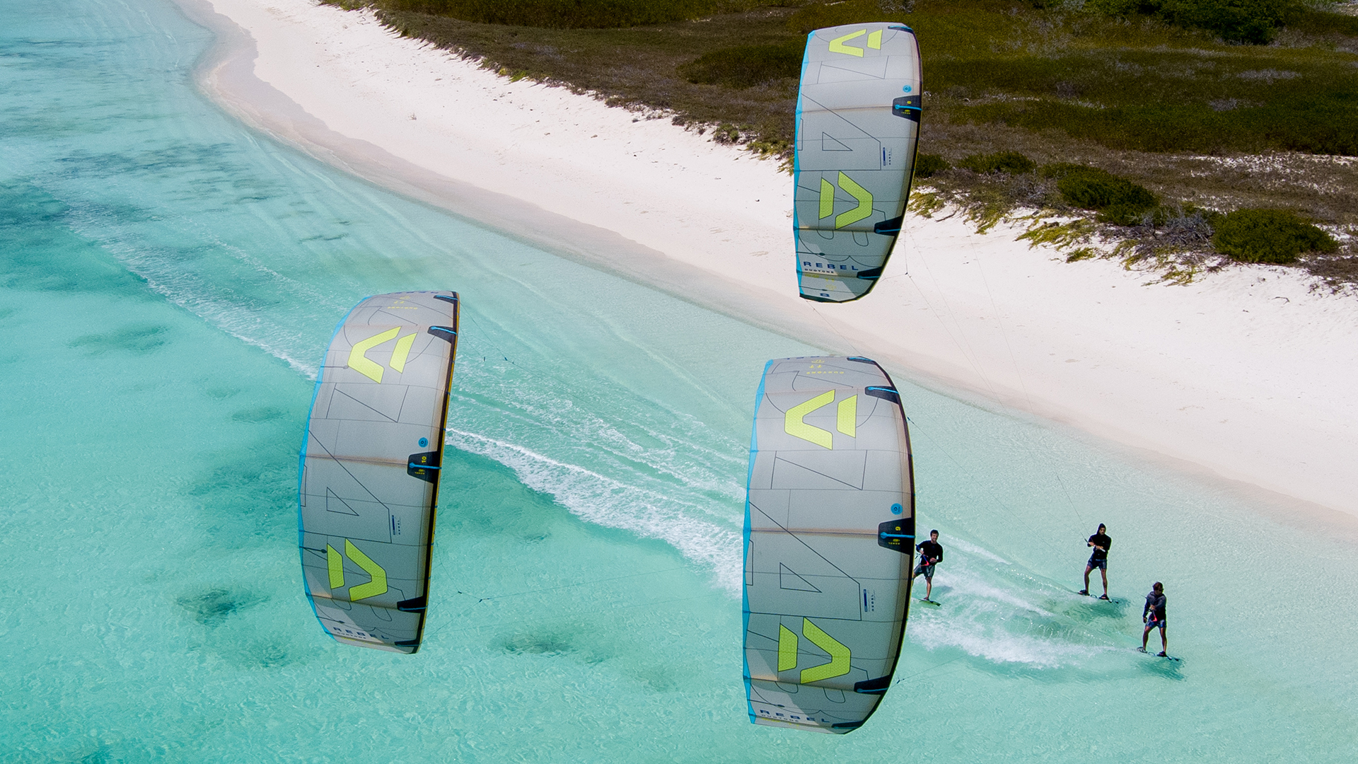 three athletes in action with Duotone kites during a big air kitesurf session